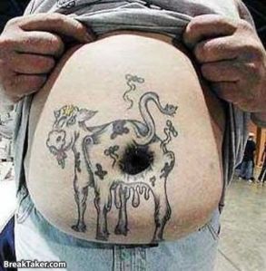 Holy Cow!...This thing is so ugly tattoo removal isn't good enough, the guy should have a beer belly-ectomy. 